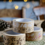 Close up of the Babipur brown kraft eco paper tape in the Autumn leaf and festive prints