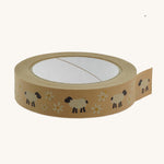 A roll of Babipur eco paper craft tape in brown with a sheep and daisies print.