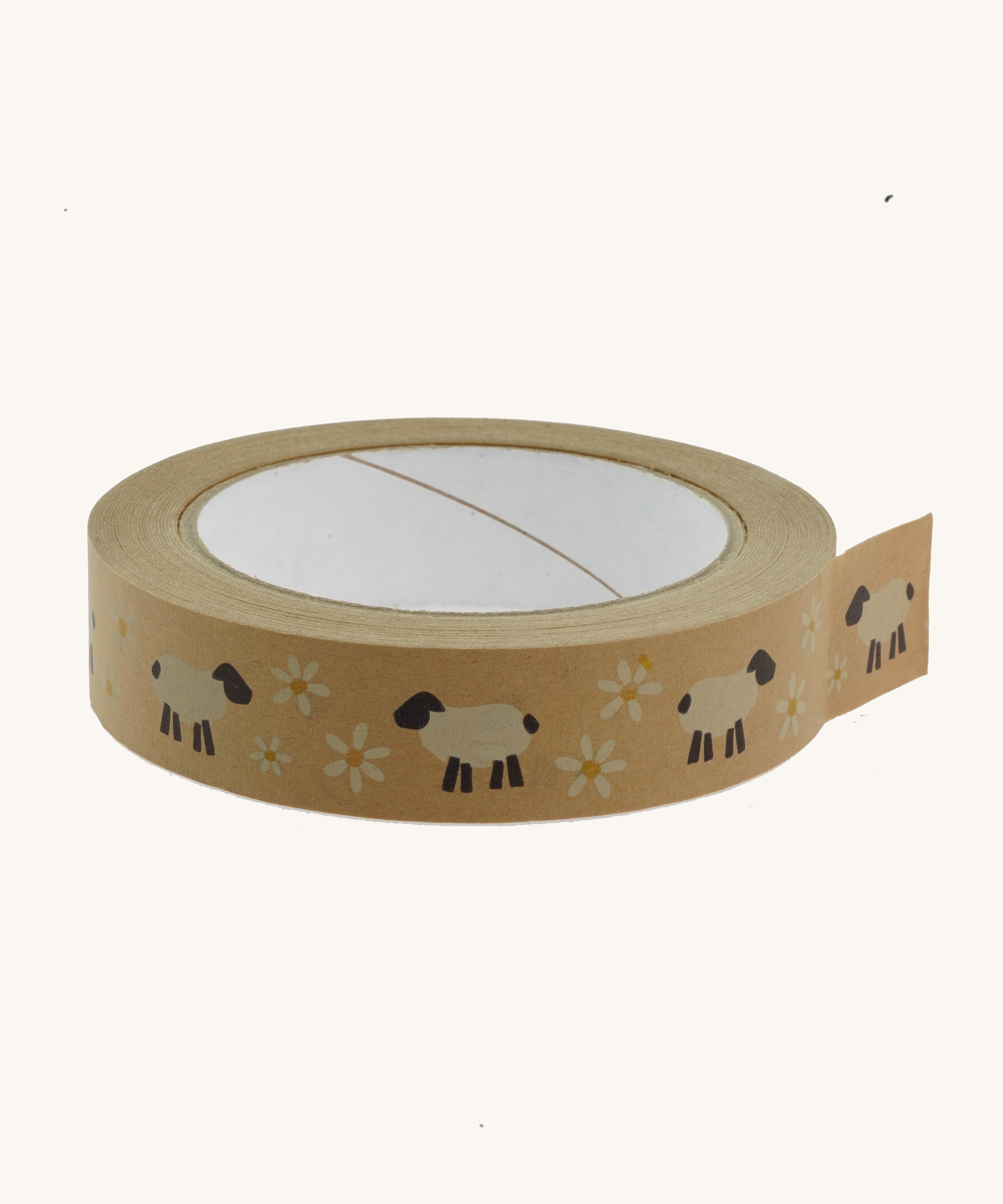 A roll of Babipur eco paper craft tape in brown with a sheep and daisies print.