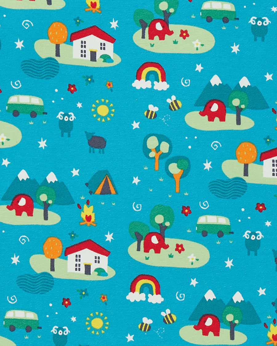 A close up of the pattern on the Frugi X Babipur Tobermory Camp Out Libby Printed children's leggings with colourful suns