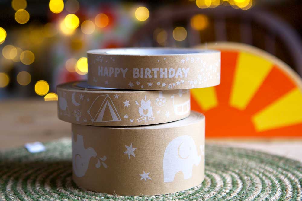 Stack of three babipur design kraft paper tapes with Happy Birthday