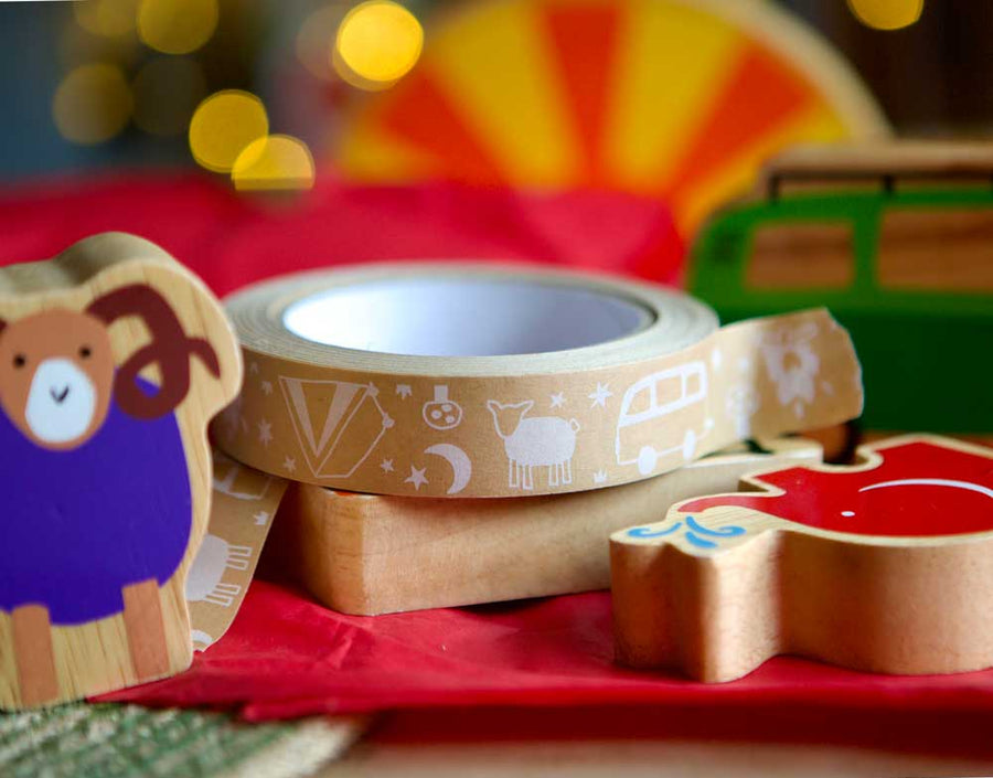 Babipur eco kraft recyclable camping design paper tape alongside wooden Lanka Kade figures