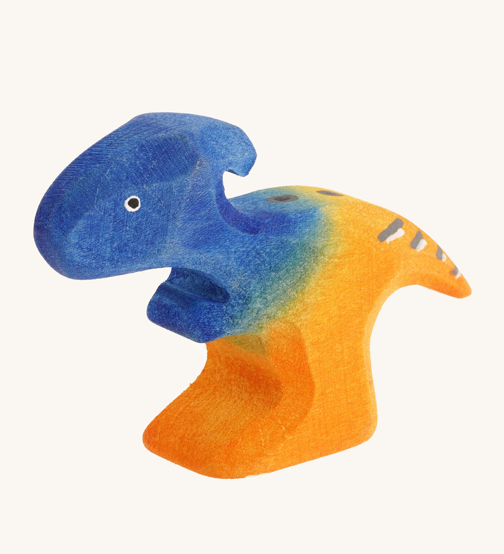 Blue and orange standing baby Parasaurolophus on a cream background