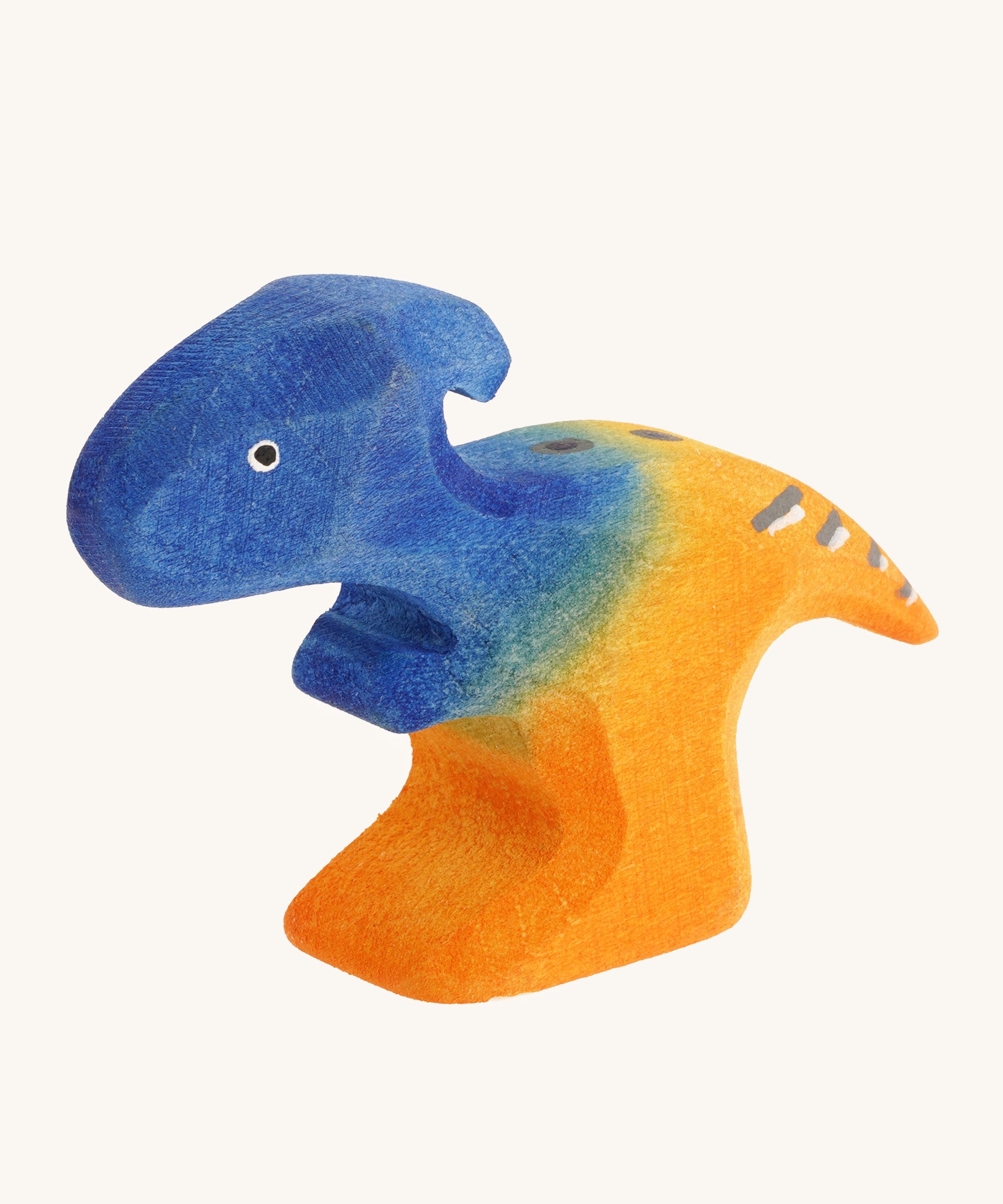 Blue and orange standing baby Parasaurolophus on a cream background