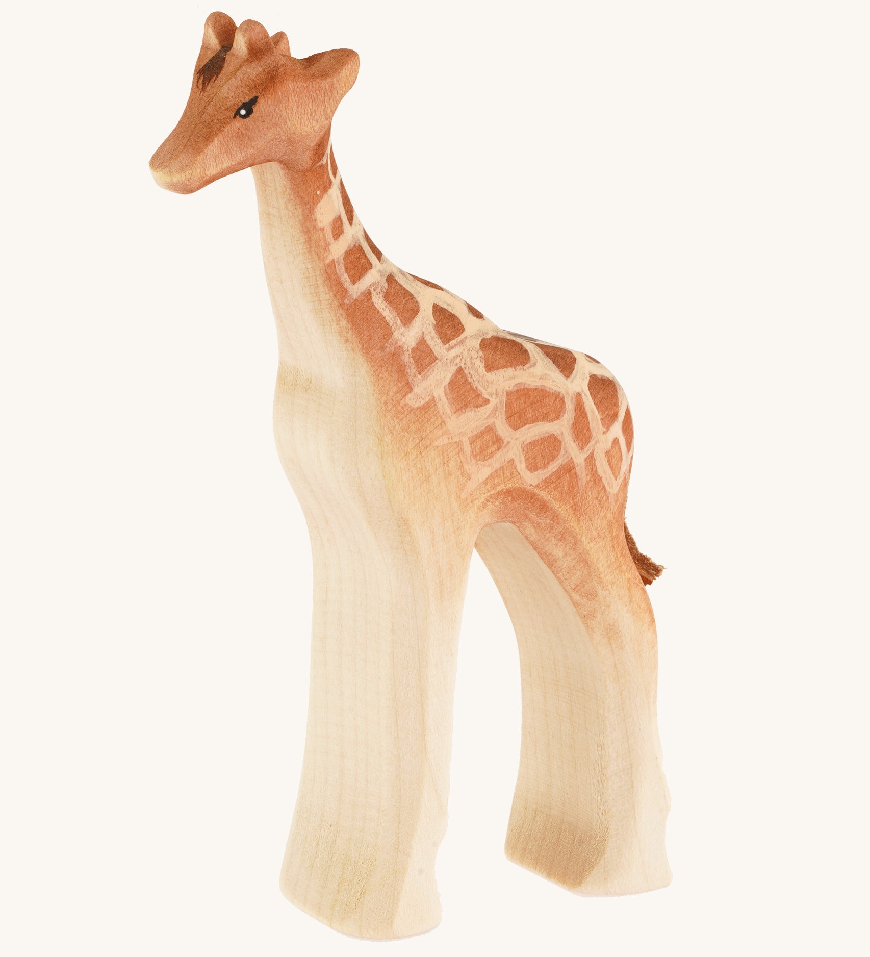 Baby wooden standing Giraffe on a cream background