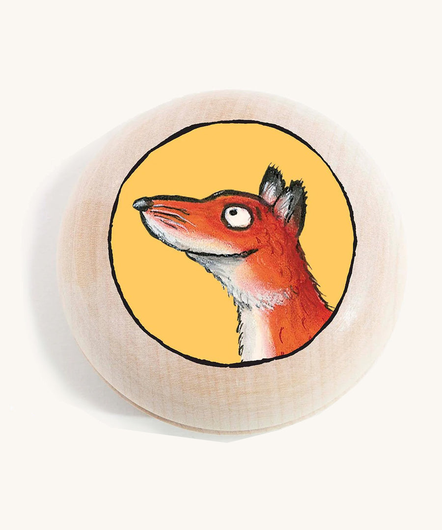 a fox gruffalo character wooden magnet on a cream background