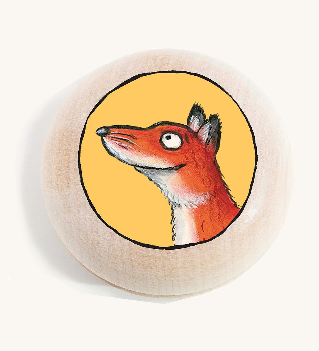 a fox gruffalo character wooden magnet on a cream background