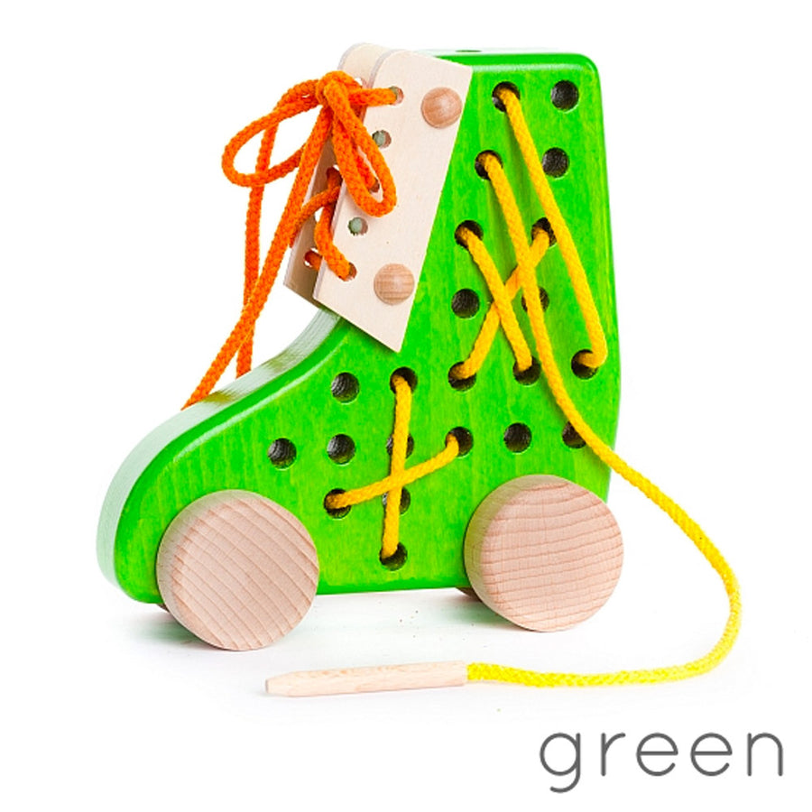 Bajo children's green wooden lacing shoe toy on a white background