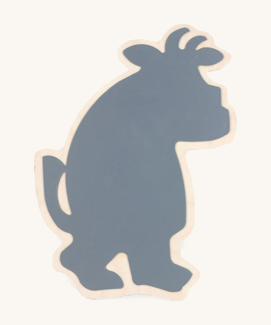 A wooden Gruffalo magnet board on a cream background.