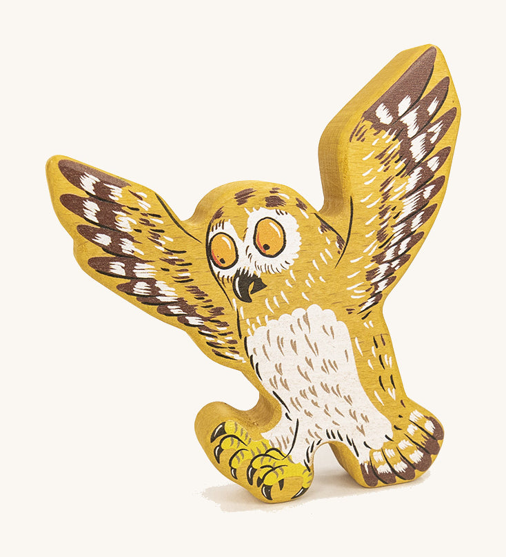 Bajo plastic-free wooden Gruffalo owl figure on a cream background