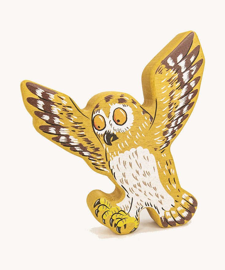 Bajo plastic-free wooden Gruffalo owl figure on a cream background