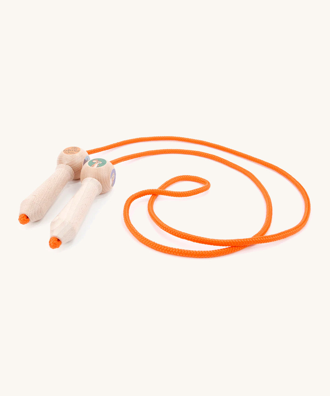 A wooden gruffalo skipping rope with orange rope on a cream background