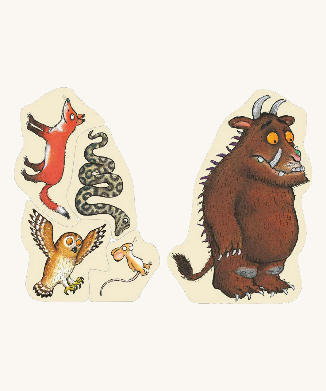 A wooden Gruffalo puzzle pieces on a cream background