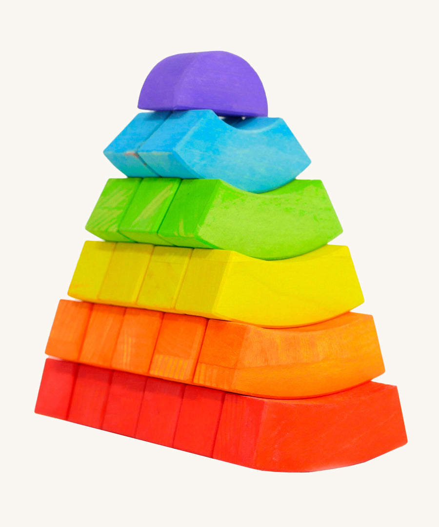 2 colourful towers made from Bajo plastic-free wooden rainbow toy blocks