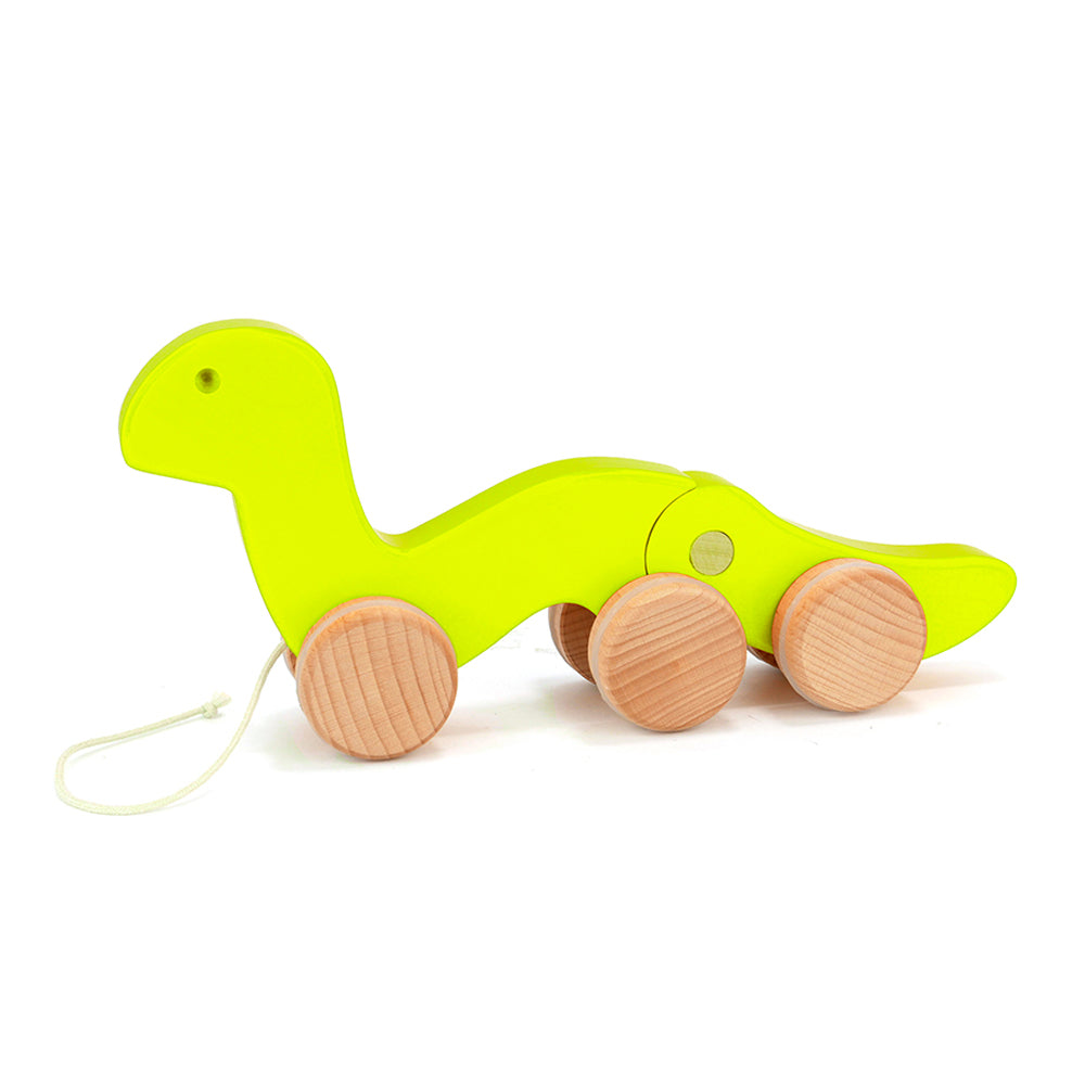 Bajo childrens handmade wooden wiggly worm pull along toy in light green on a white background