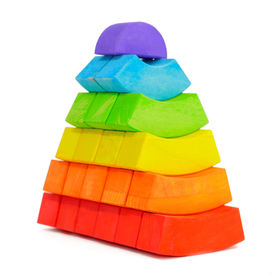 2 colourful towers made from Bajo plastic-free wooden rainbow toy blocks