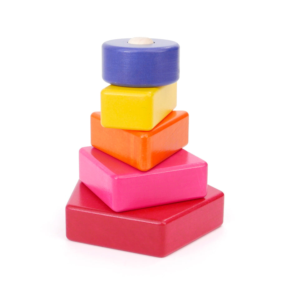 Bajo children's wooden stacking shapes piled into a colourful pyramid on a white background