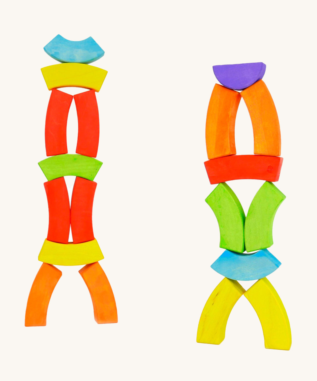 2 colourful towers made from Bajo plastic-free wooden rainbow toy blocks