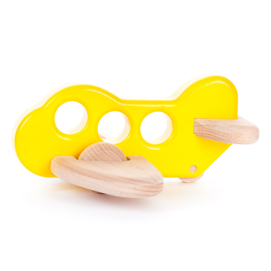 Bajo children's yellow handmade wooden plane toy on a white background