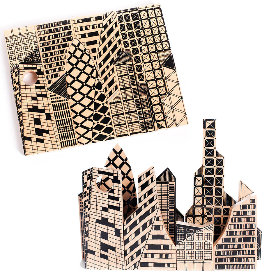 The Bajo City Puzzle is a chunky 9-piece wooden puzzle that can be used to make a striking monochrome cityscape jigsaw