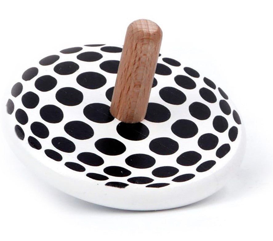 Bajo Spinning Tops create a mesmerising effect when they're spun - the Dots design is a black spotty pattern on white and is made from solid wood. White background. 