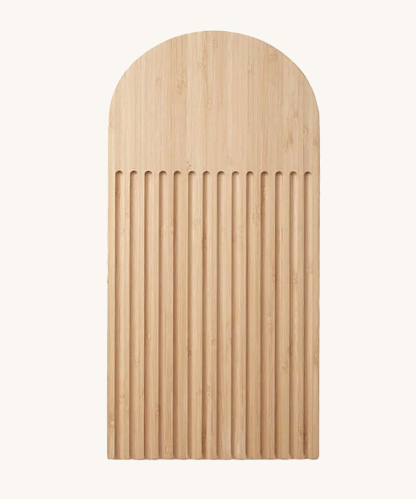 A Bambu bamboo Arch Bread Board on a plain background.