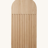 A Bambu bamboo Arch Bread Board with crumb catching ridges