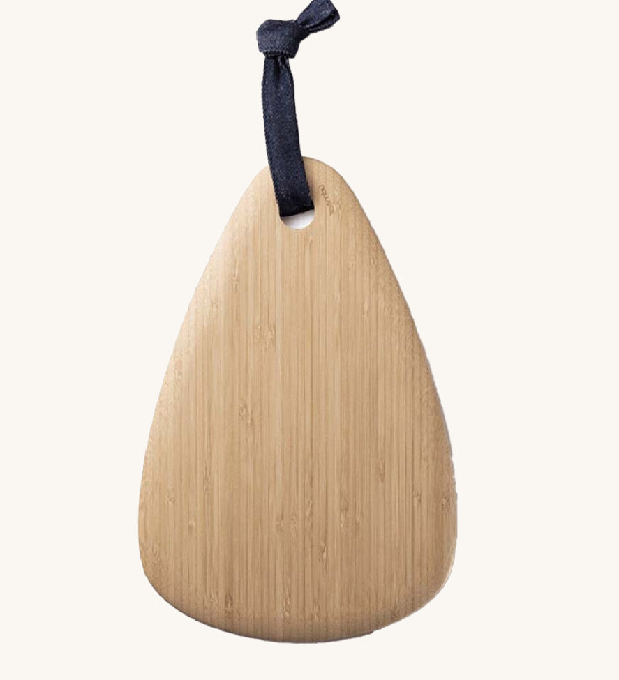 A Bambu Droplet shaped Artisan bamboo Board on a plain background. 