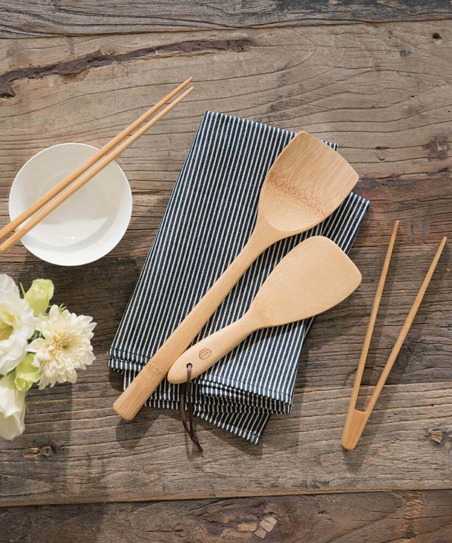 A collection of Bambu Bamboo kitchen utensils and cutlery.