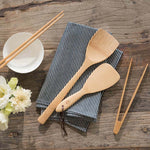 A collection of Bambu Bamboo kitchen utensils and cutlery.