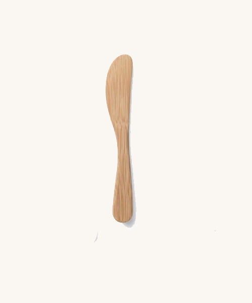 A Bambu bamboo Mini Spreader on a plain background. 