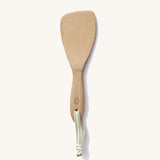 A Bambu Bamboo Rice Paddle on a plain background. 