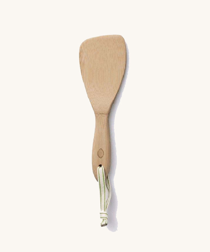 A Bambu Bamboo Rice Paddle on a plain background. 