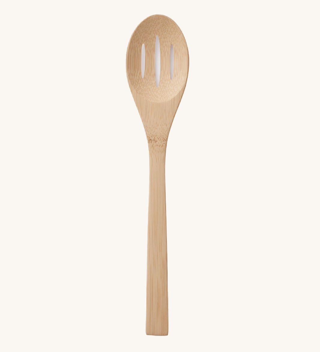 A Bambu Bamboo Slotted Spoon from the Give It A Rest  collection 