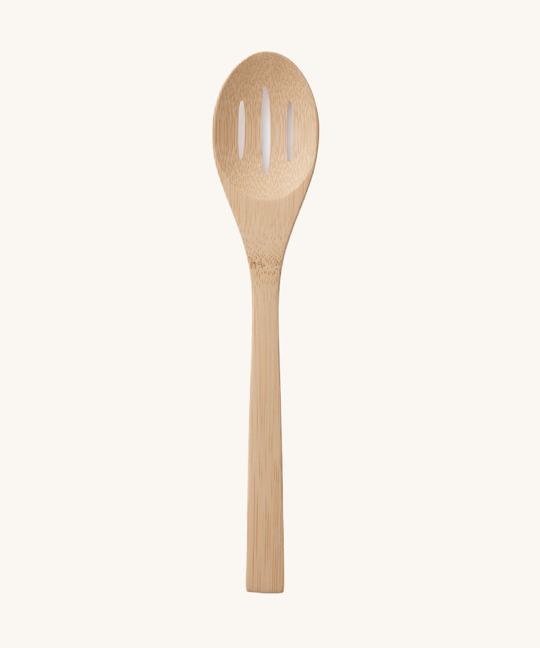 A Bambu Bamboo Slotted Spoon from the Give It A Rest  collection 