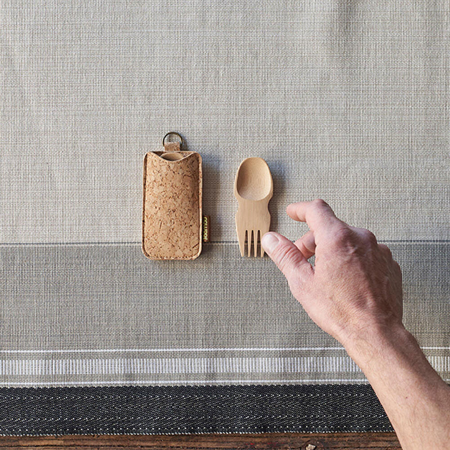 Bambu Bamboo Spork & Cork Case pictured on linen tablecloth