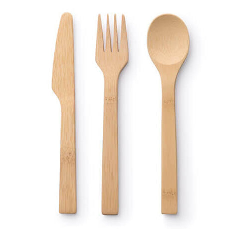 Fork & Spoon Set pictured on a cotton napkin on a patterned tablecloth