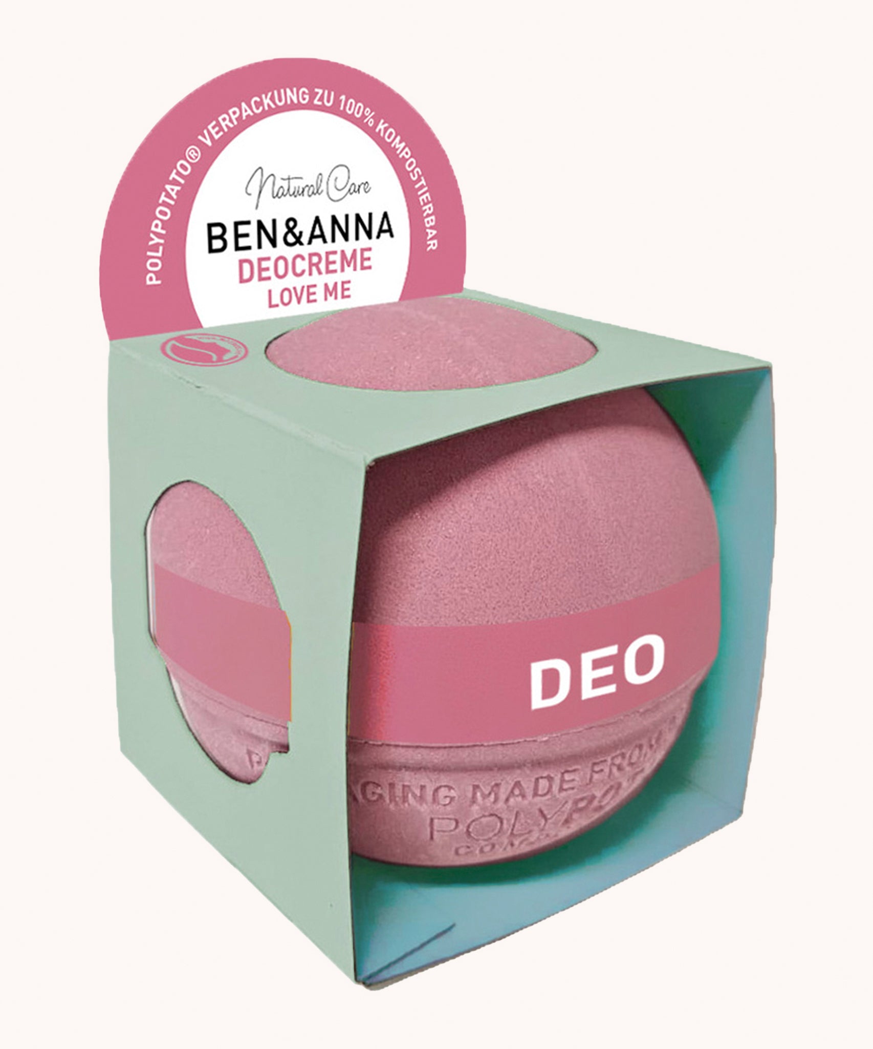 Ben & Anna Deo Creme - Love Me 45g. A moisturising, light, creamy deodorant creme balm in a pink compostable sphere packaging, on a white background