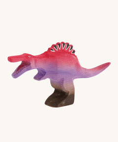 Pink and purple big standing spinosaurus on a cream background 