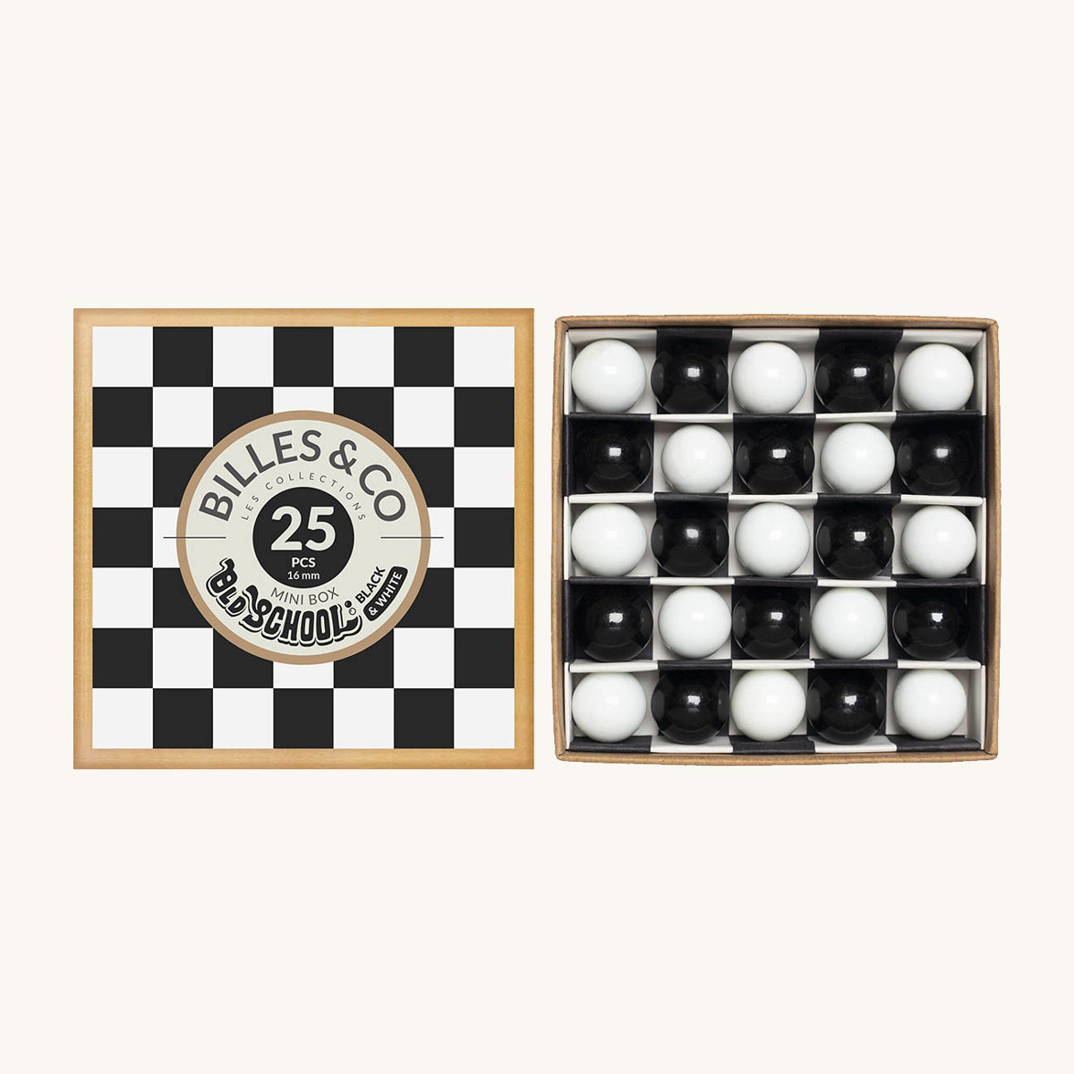 with black and white marbles scattered around the box