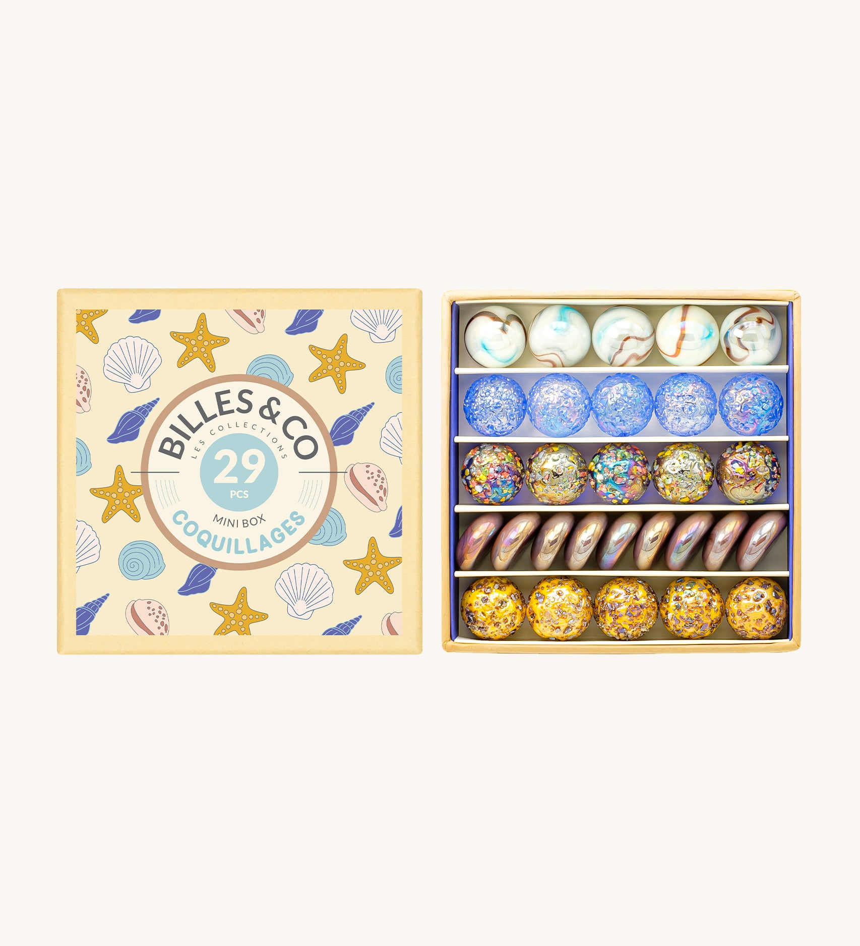 Billes & Co Seashells Glass Marbles Mini Box - 29 Pack. Flat and round marbles in a smooth or textured finish, with glossy seashell and beach colours