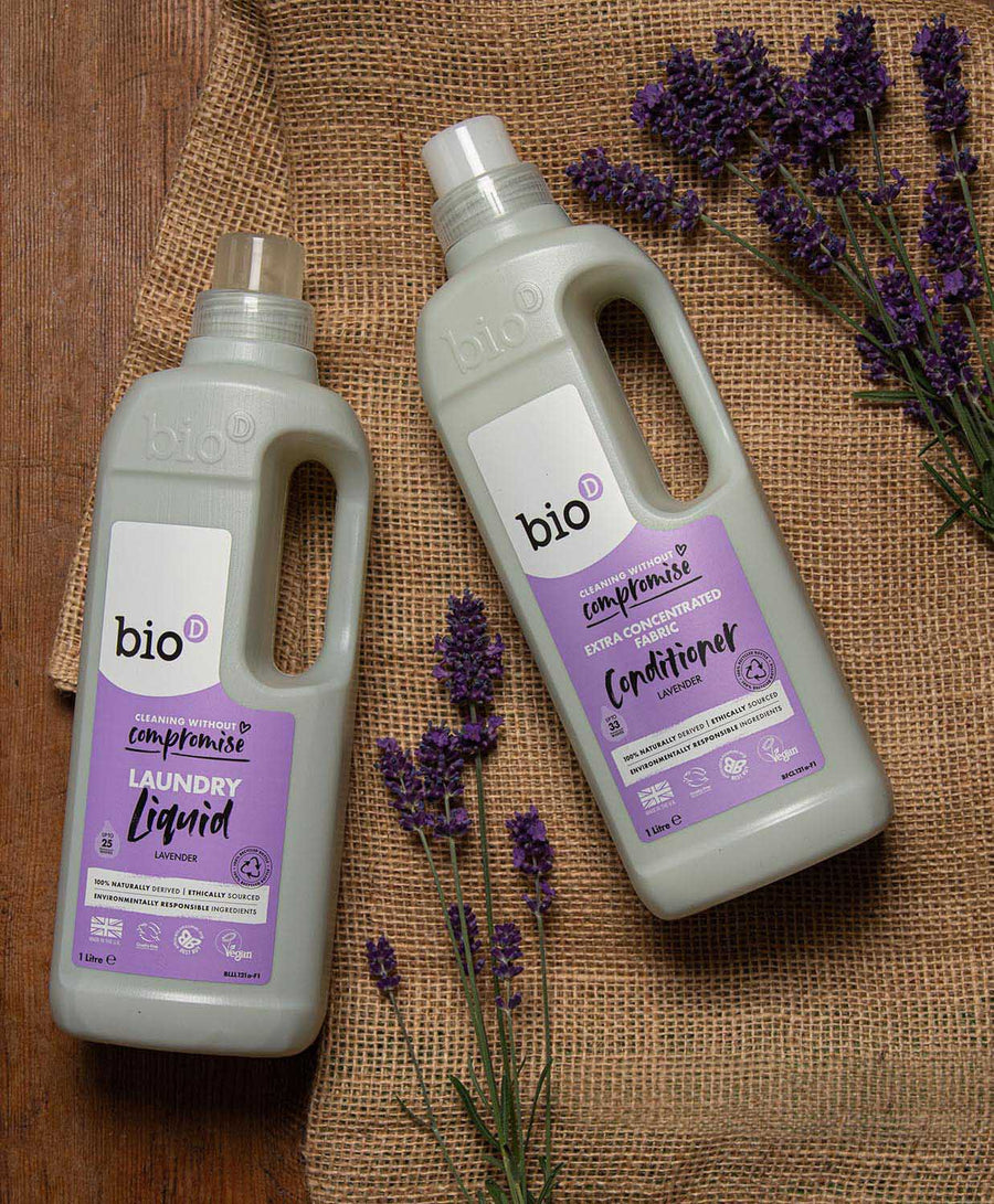 Bio D eco-friendly vegan lavender laundry liquid 1L bottle and conditioner 1 Litre bottle on a white towel