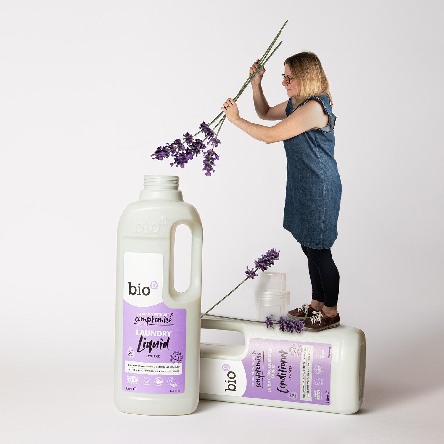 Bio D eco-friendly vegan lavender laundry liquid 1L bottle and conditioner 1 Litre bottle on a grassy background