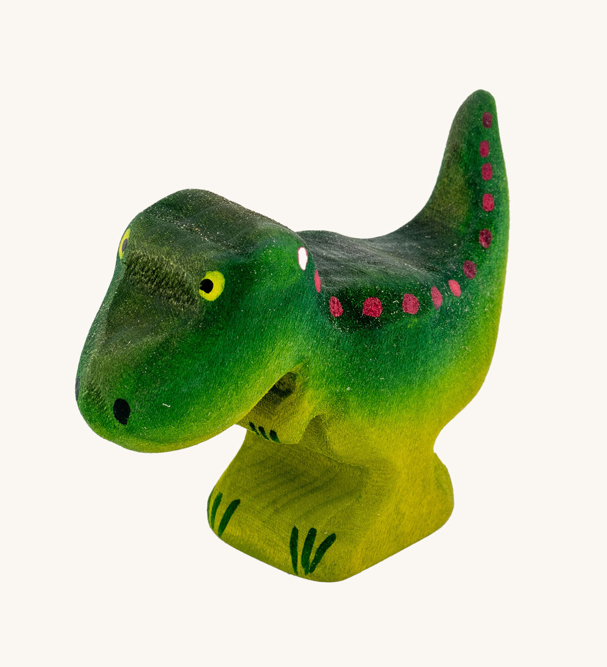 Bumbu Baby Wooden T-Rex Dinosaur on a plain background.