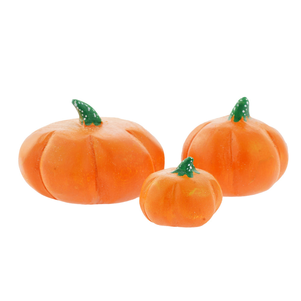 3 Bumbu handmade wooden pumpkin toys on a white background