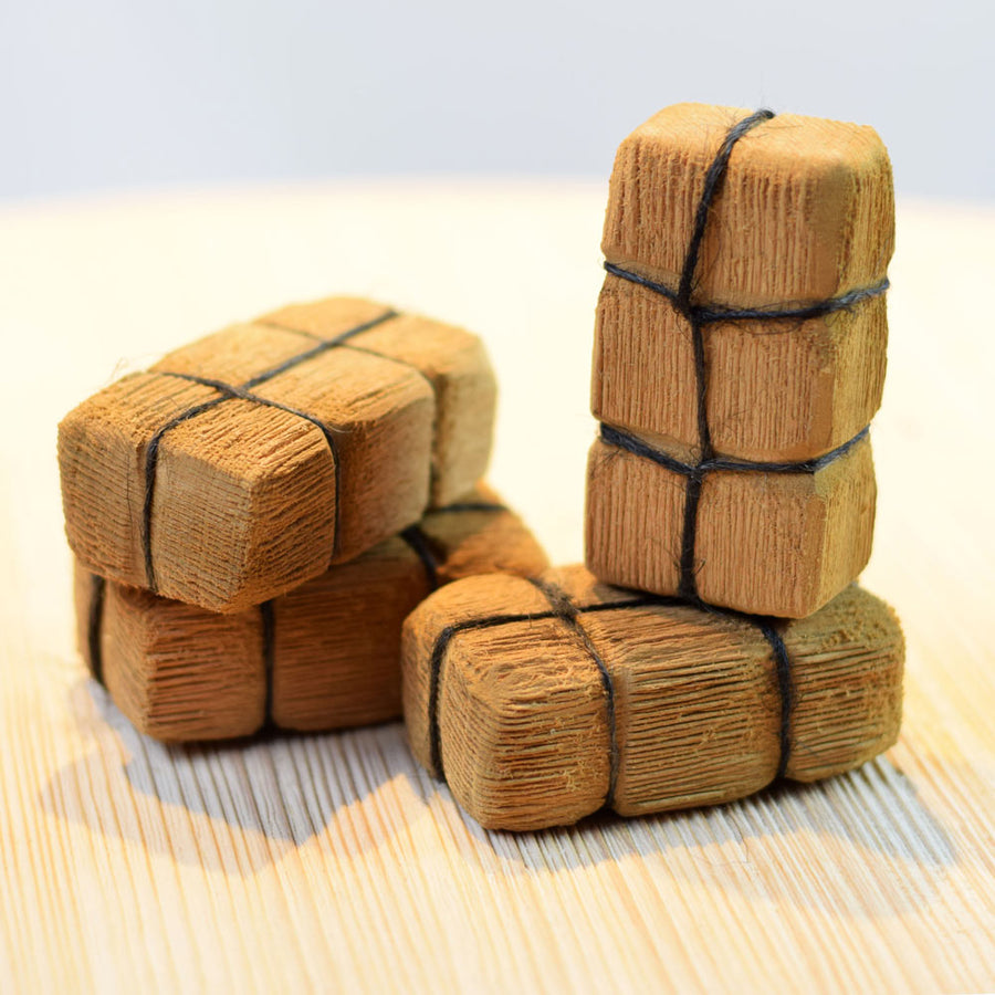 Bumbu childrens wooden haystack toy block set stacked up on a light wooden work top