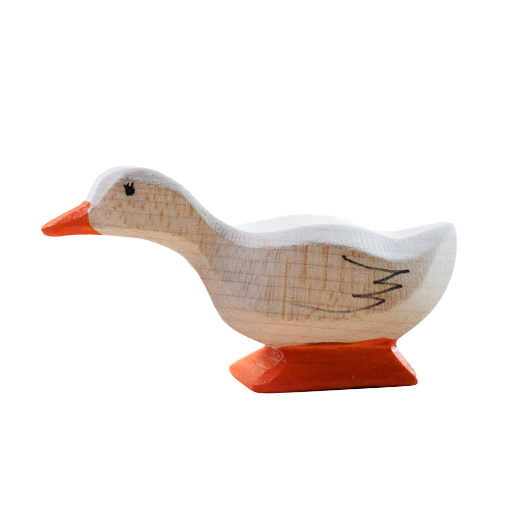 Bumbu hand carved wooden duck figure on a white background