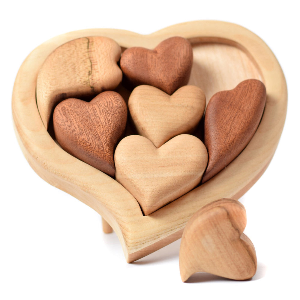 Bumbu eco-friendly wooden heart puzzle set stood up on a white background