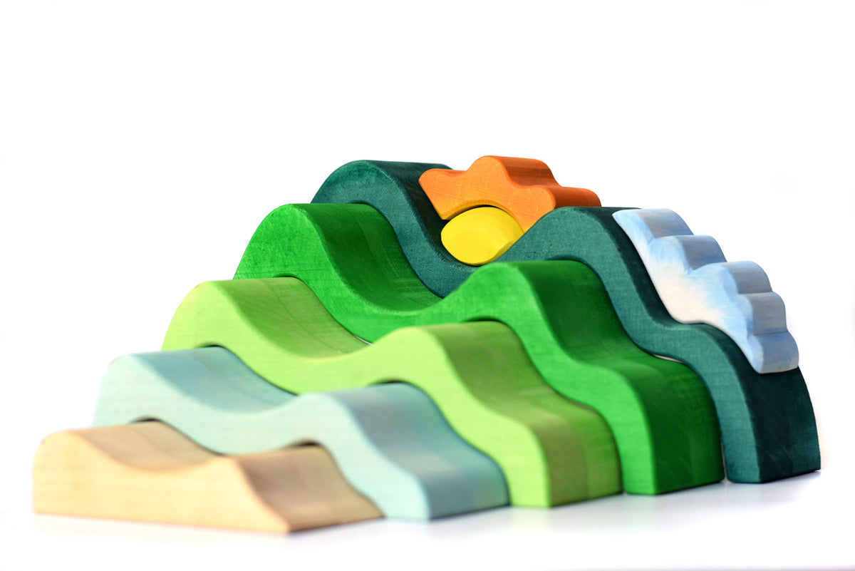 Close up of the Bumbu eco-friendly plastic free wooden mountain set on a white background