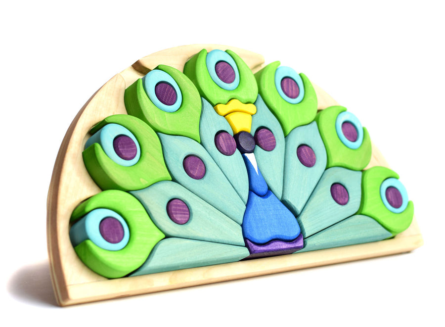 Bumbu eco-friendly plastic free wooden peacock shape puzzle stood up on a white background